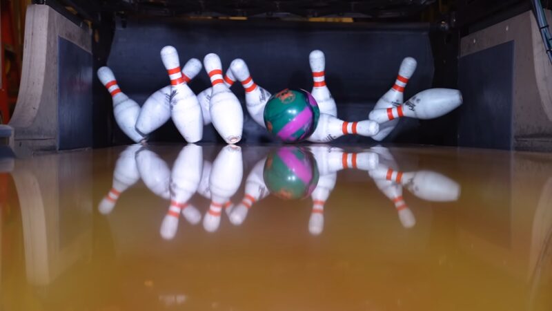 Knocking down all the pins in bowling