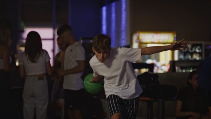 Teens play Bowling